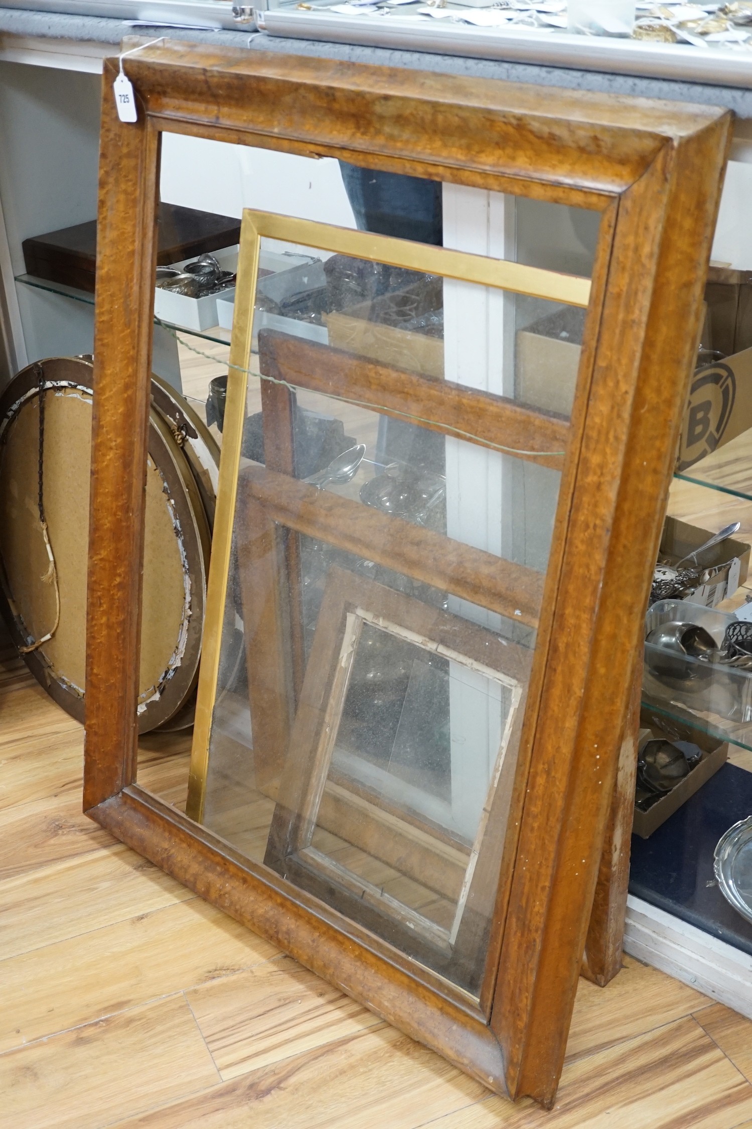 Four assorted Victorian maple picture frames, largest aperture 90 x 63cm